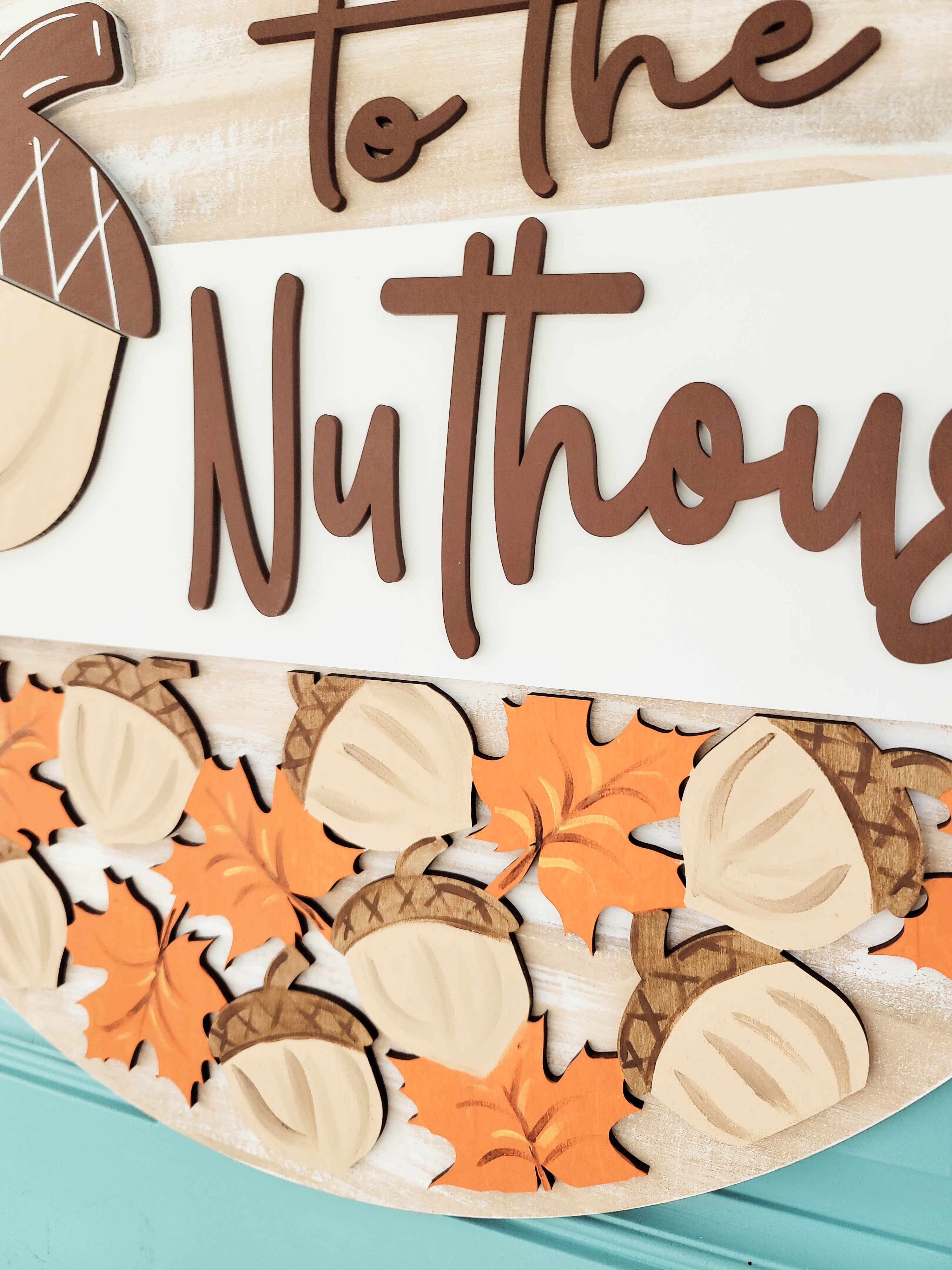 DIY Welcome to the Nuthouse Door Hanger